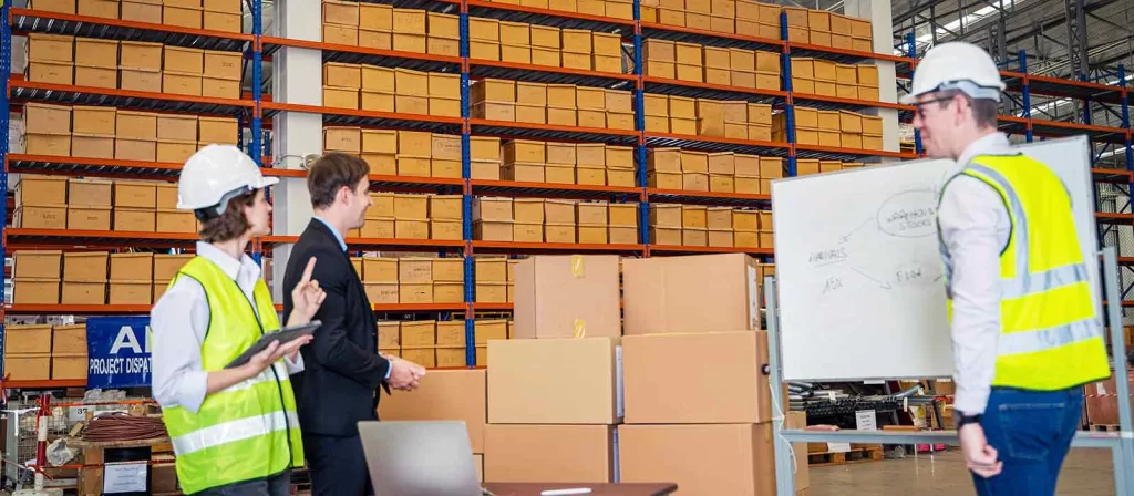 Mastering ERP Systems: The Ultimate Handbook 6 warehouse-female-worker-checking-up-stuff-in-a-warehouse-for-optimizing-the-inventory-resources-using-high-tech-device